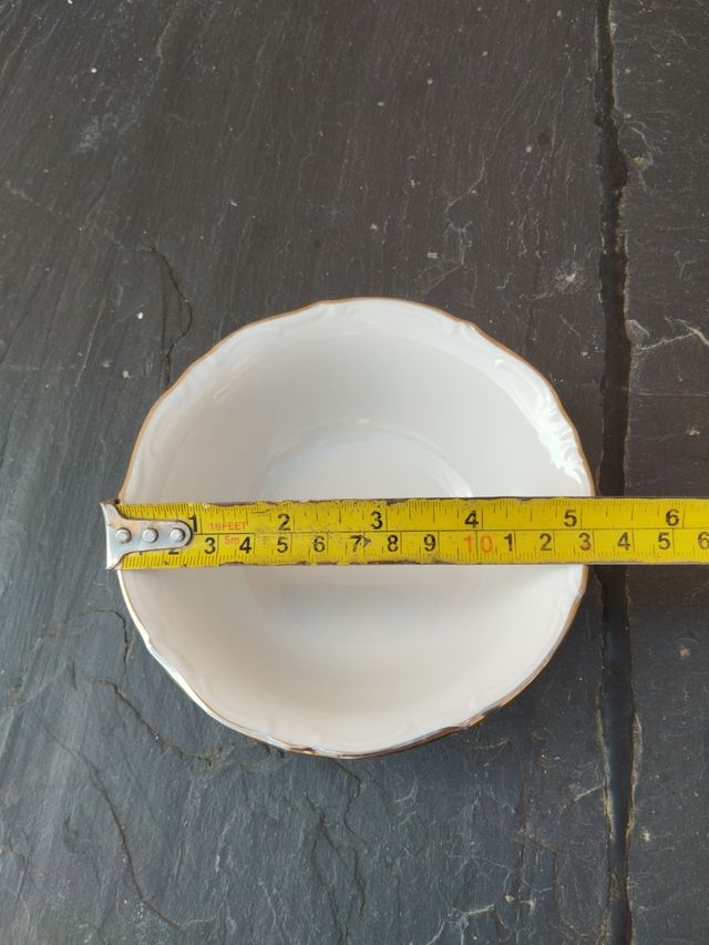 6 Cuencos porcelana Winterling borde plateado.