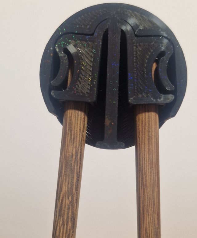 Ayudante para palillos chinos.