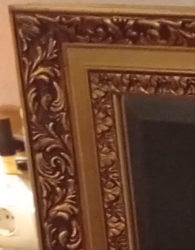 Espejo dorado grande biselado