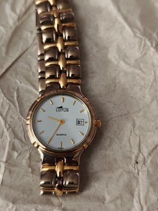 Reloj Lotus chapado oro