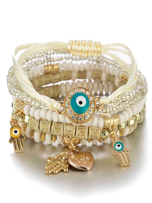 Pulseras boho azules y doradas