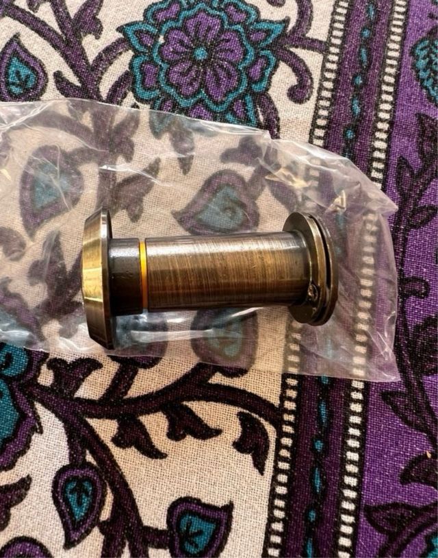 Mirilla puerta bronce