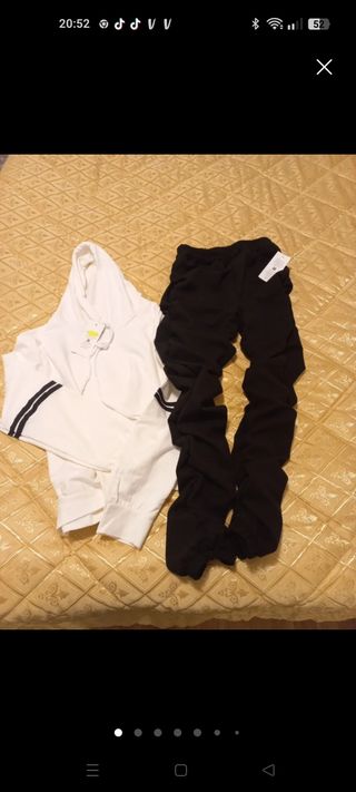 Tuta sportiva bianca e nera