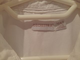 2 Camisas niño: estampada y blanca
