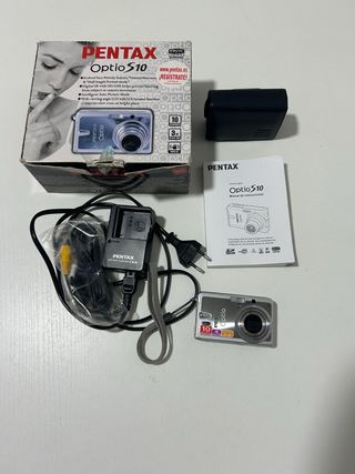 Cámara Pentax Optio S10 con fallo y accesorios