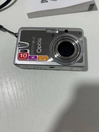 Cámara Pentax Optio S10 con fallo y accesorios