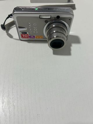 Cámara Pentax Optio S10 con fallo y accesorios