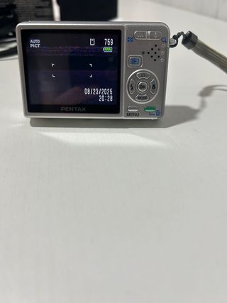 Cámara Pentax Optio S10 con fallo y accesorios