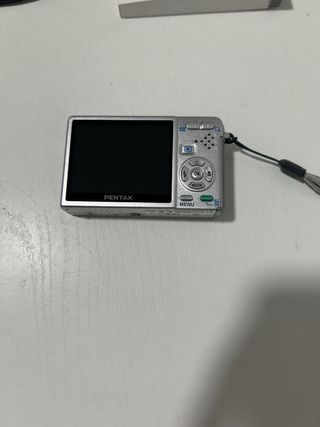 Cámara Pentax Optio S10 con fallo y accesorios