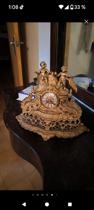 Reloj bronce antiguo