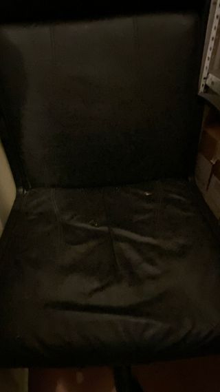Silla oficina giratoria piel negra