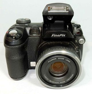 1163-Lote 5 Camaras digitales-Canon-Fuji-Traveler