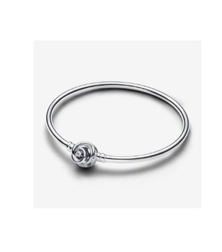 Pulsera Pandora ,un anillo y un charm