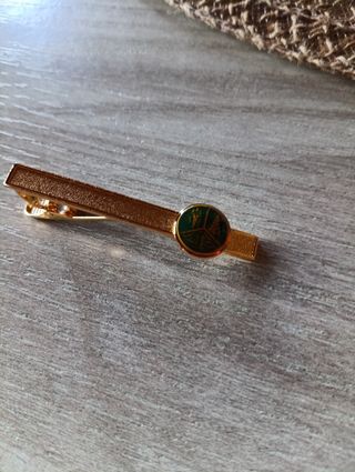 Ferma cravatta colore oro e verde