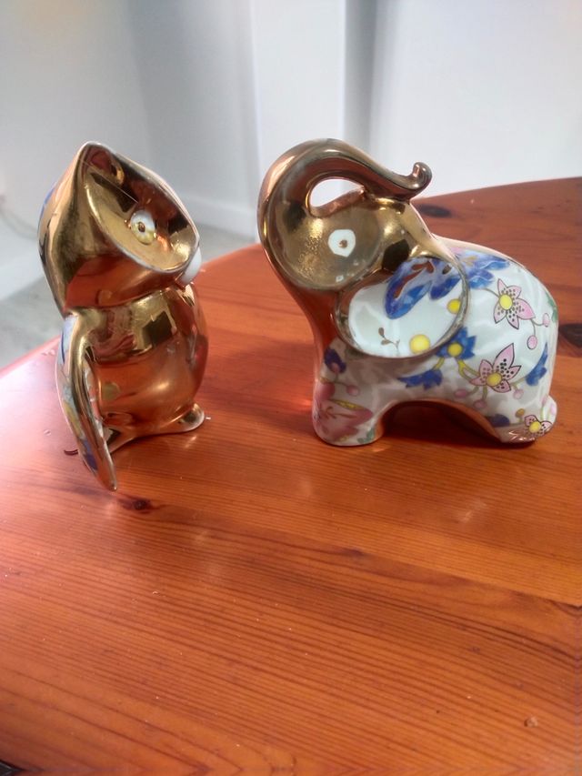 Elefante y gato de porcelana