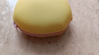 Monedero silicona gato amarillo