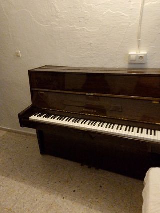 Piano acústico antiguo