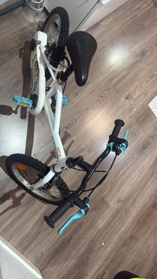 Bicicleta infantil  16 pulgadas btwin100con rodine