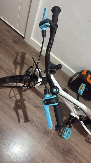 Bicicleta infantil  16 pulgadas btwin100con rodine