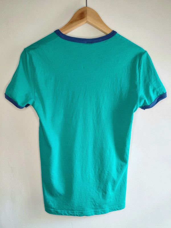 Camiseta cuello Henley abotonado ribetes Topman