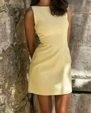 Vestido corto amarillo sin estrenar