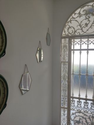 3 Espejos hexagonales dorados