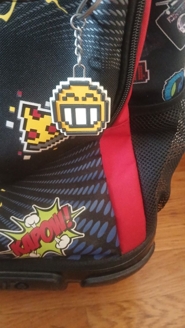 Mochila Totto con ruedas estampado multicolor