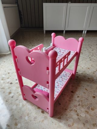 Litera muñecas rosa