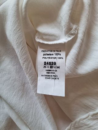 Blusa bianca con incrocio sulla schiena 