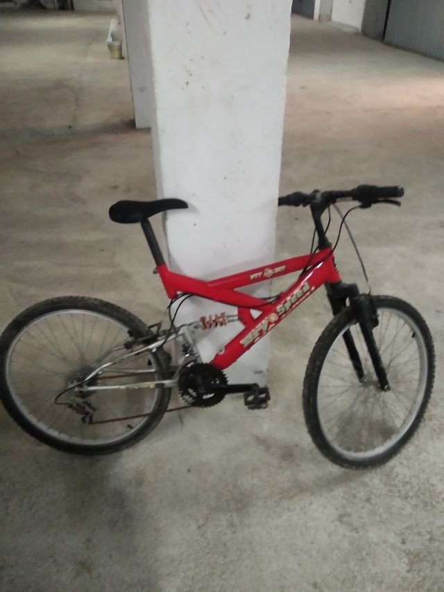 Bicicleta montaña doble suspensión