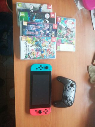 Nintendo Switch + 5 juegos,128gb y 2 mandos pro