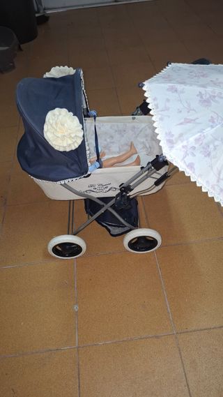Carrito muñecas  con sombrilla