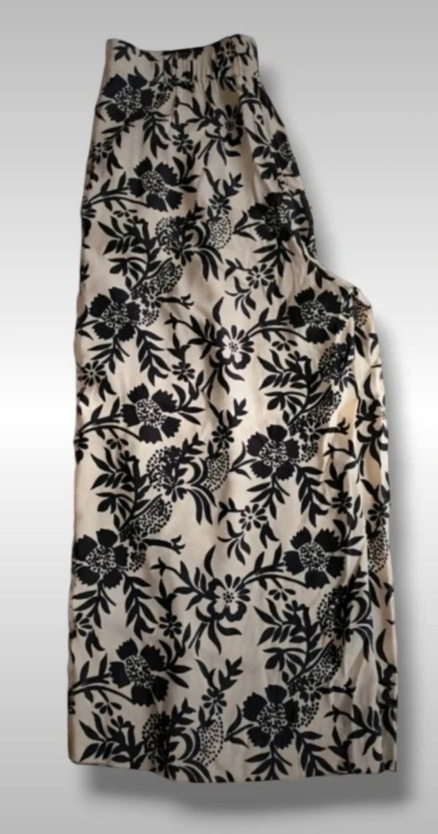 Pantalones acampanados beige y negro