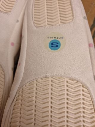 Zapatillas blancas énfasis