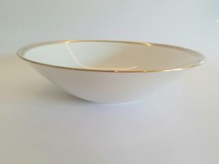 Insalatiera vintage in ceramica con bordo dorato 