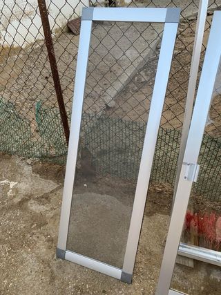 Ventana, contraventana y mosquitera.