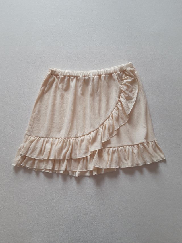 Minigonna color panna con volant