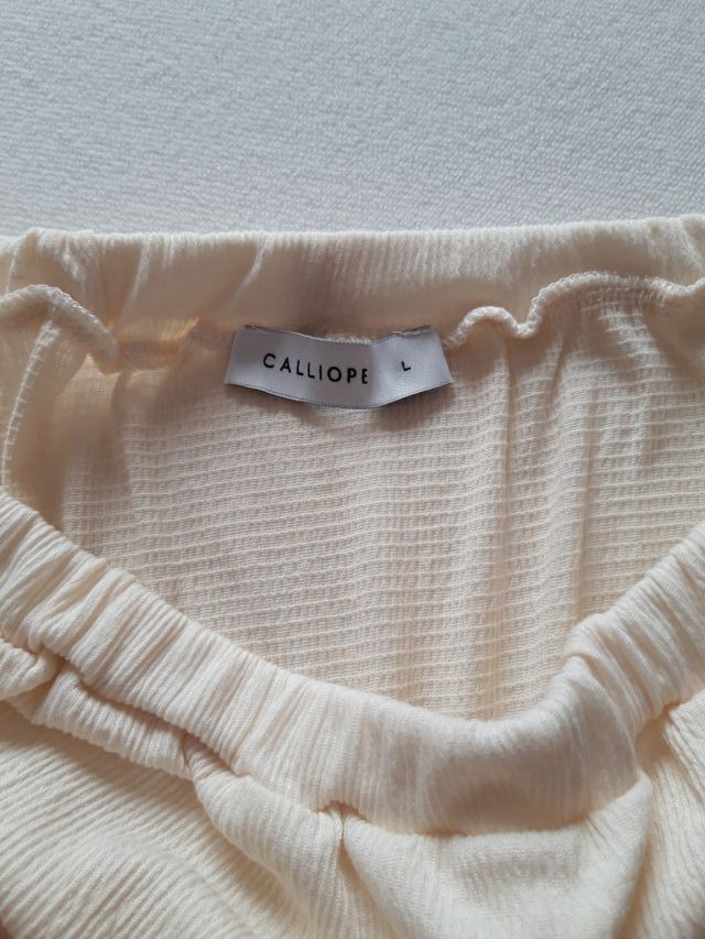 Minigonna color panna con volant