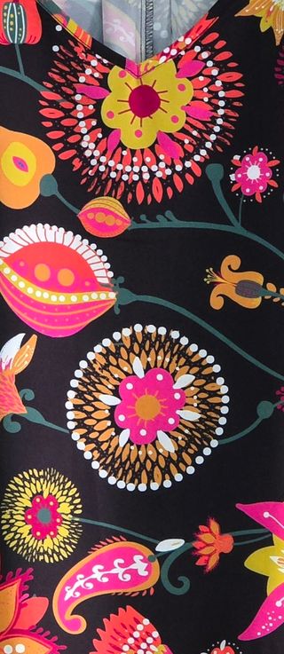 Top negro estampado tropical de tirantas.