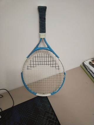 dos raquetas
 Tenis Infantil