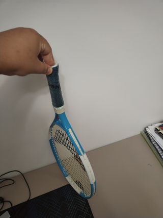 dos raquetas
 Tenis Infantil