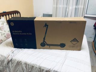 Patinete eléctrico co su caja 