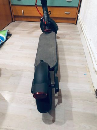 Patinete eléctrico co su caja 