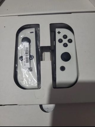 Nintendo Switch OLED - Blanca y Negra