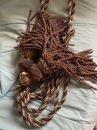 Accessori per tende: fermatende a nappa in corda 