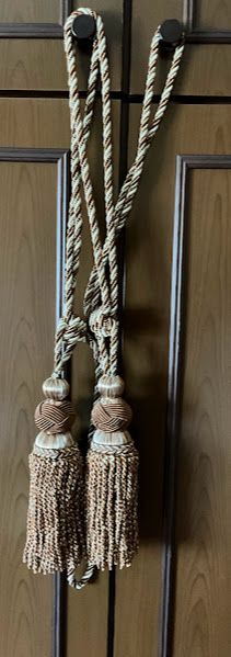 Accessori per tende: fermatende a nappa in corda 