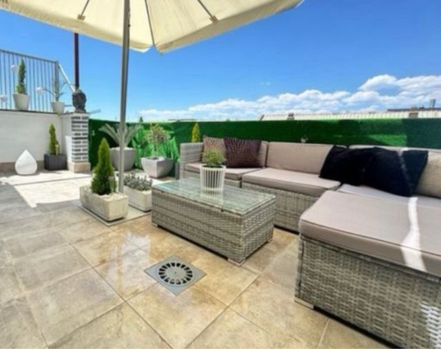 Sofá ratán gris exterior