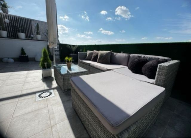 Sofá ratán gris exterior