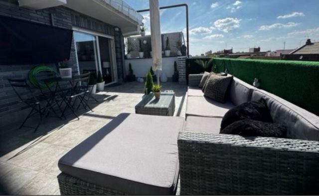 Sofá ratán gris exterior