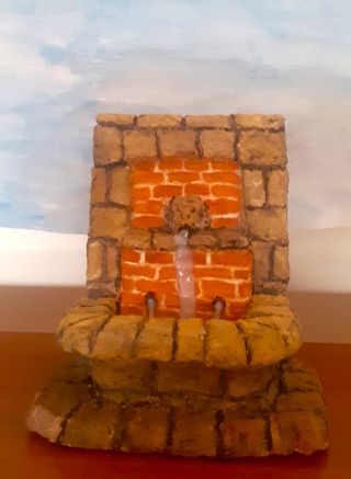 Fuente artesanal Belén piedra y ladrillos con león